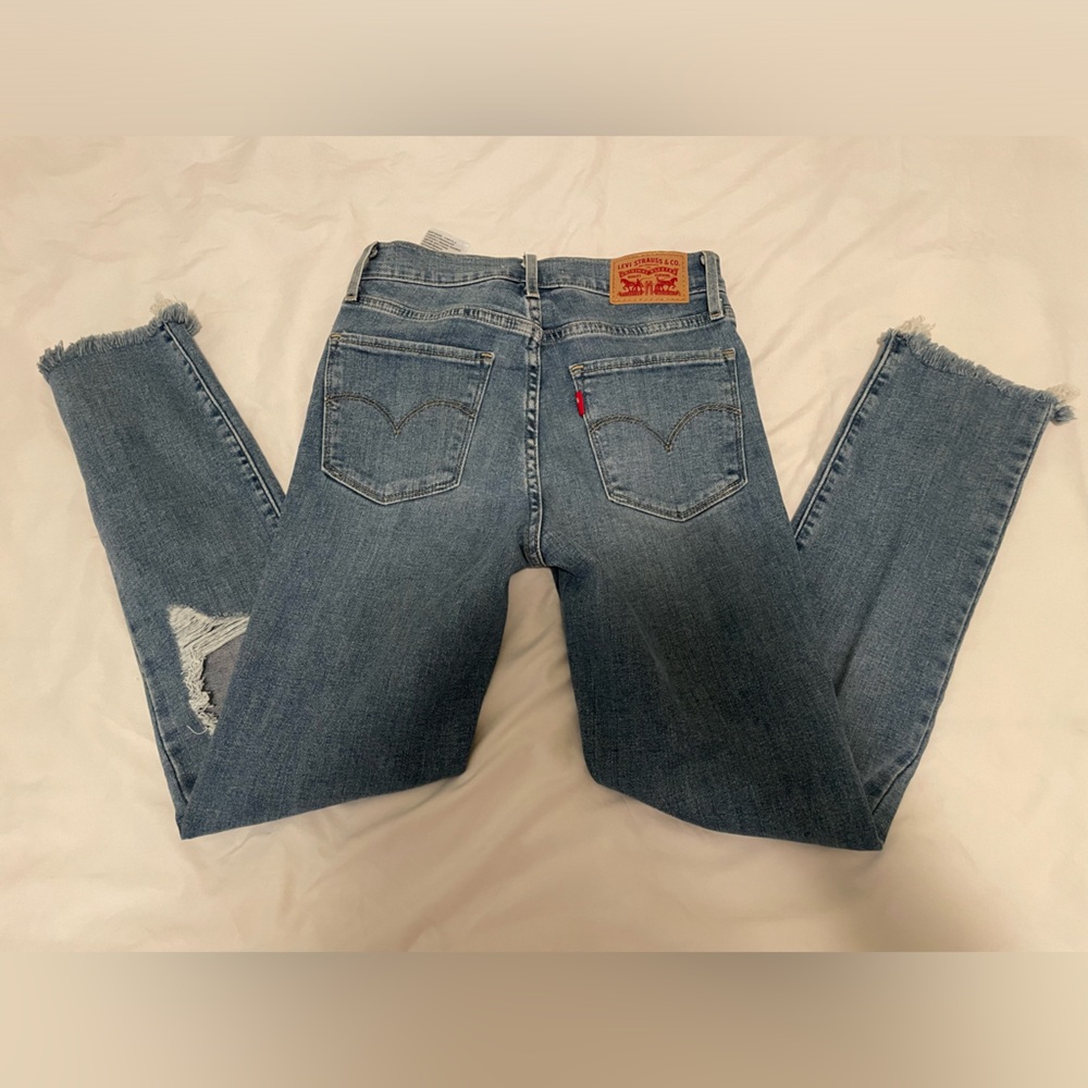 724 HIGH RISE STRAIGHT LEVIS SIZE 24